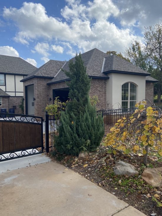 Brick Custom Garage Showcasing Residential Craftsmanship in Oklahoma City, OK